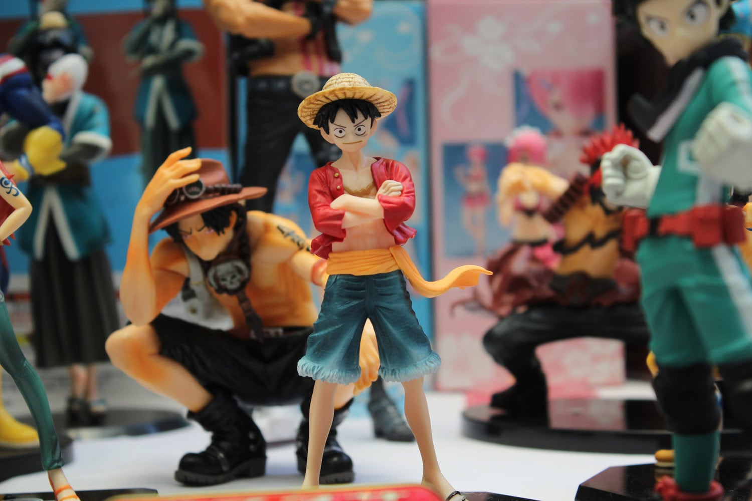 anime action figures on table