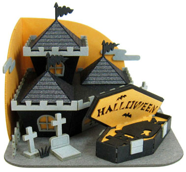 A black and orange Halloween paper house kit.
