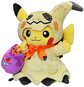 An adorable Pikachu Halloween plush dressed up in a ghost costume.