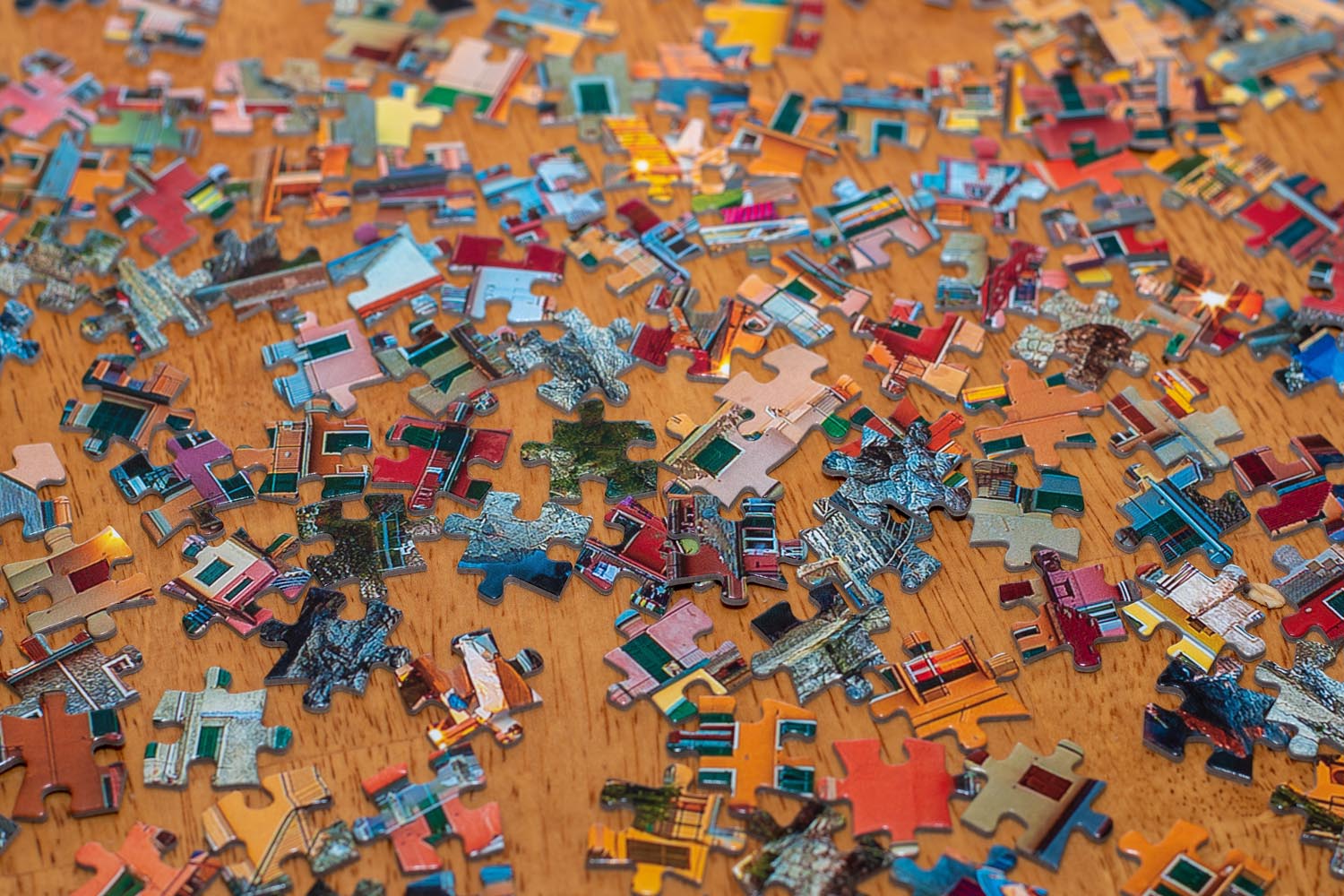 colorful jigsaw puzzle pieces on table