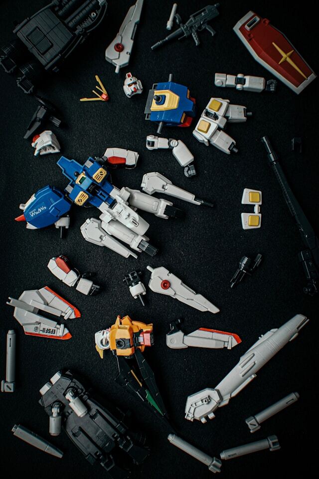 Partially assembled classic Gundam lying on a table